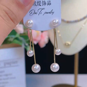 Pearl tassel earrings, simple earrings, light luxury, niche, versatile, fashionable, long earrings, long tassels