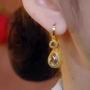 New durian pendant earrings with niche design, versatile temperament, light luxury earrings, ear buckles, ear clips for women